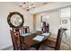 Dining room with a view into the kitchen and living areas at 1753 Naftal Rd, North Port, FL 34288