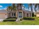 Single story home with tile roof and landscaped yard at 2615 Rio Plato Dr, Punta Gorda, FL 33950