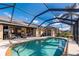 Inviting pool with screened enclosure, offering a tranquil escape at 2615 Rio Plato Dr, Punta Gorda, FL 33950