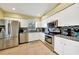 Modern kitchen with stainless steel appliances and granite countertops at 4040 S Cranberry Blvd, North Port, FL 34286