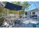 Outdoor patio with table and chairs, perfect for dining al fresco at 4040 S Cranberry Blvd, North Port, FL 34286