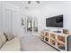 Den with glass doors opening to adjacent living space at 9973 Calumet Blvd, Port Charlotte, FL 33981