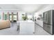 Modern kitchen with large island and stainless steel appliances at 9973 Calumet Blvd, Port Charlotte, FL 33981