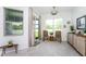 Bright breakfast nook with window seating and access to patio at 9973 Calumet Blvd, Port Charlotte, FL 33981