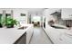 Modern kitchen with white cabinets and center island at 9973 Calumet Blvd, Port Charlotte, FL 33981