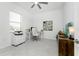 Home office with desk, chair, and built-in shelving at 9973 Calumet Blvd, Port Charlotte, FL 33981