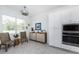 Bright kitchen with white cabinets, stainless steel appliances, and a breakfast nook at 9973 Calumet Blvd, Port Charlotte, FL 33981