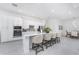 Modern kitchen with large island and white cabinetry at 9973 Calumet Blvd, Port Charlotte, FL 33981