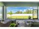 Enjoyable screened patio showcasing a view of the backyard at 9973 Calumet Blvd, Port Charlotte, FL 33981