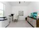Modern home office with a desk, chair, and stylish decor at 9973 Calumet Blvd, Port Charlotte, FL 33981