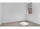 Simple bedroom with wood-look floors and a window at 13164 Amaryllis Cir, Port Charlotte, FL 33981