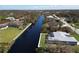 Waterfront property with canal access and surrounding homes at 13164 Amaryllis Cir, Port Charlotte, FL 33981