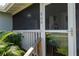 Home's front entrance with a screened porch at 860 Columbia St, Port Charlotte, FL 33948