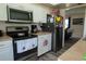 Well-equipped kitchen with stainless steel appliances and ample counter space at 860 Columbia St, Port Charlotte, FL 33948