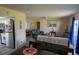 Open living and dining area with comfortable seating and a view into the kitchen at 860 Columbia St, Port Charlotte, FL 33948