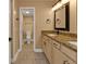 Double vanity bathroom with granite countertop at 1355 Saxony Cir # 211, Punta Gorda, FL 33983