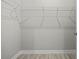 Walk-in closet featuring wire shelving and ample storage space at 2404 Hanford Ln, North Port, FL 34288
