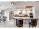 Modern kitchen with white cabinets, granite countertops, and stainless steel appliances at 2868 Coral Way, Punta Gorda, FL 33950