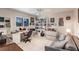 Home office with built-in shelving, desk, and comfortable seating at 2868 Coral Way, Punta Gorda, FL 33950