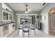 Bright dining area with glass table and chairs, and water views at 2868 Coral Way, Punta Gorda, FL 33950