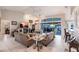 Spacious living room with vaulted ceilings, a fireplace, and water view at 2868 Coral Way, Punta Gorda, FL 33950