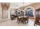 Formal dining room features dark wood furniture and a large mirror at 2868 Coral Way, Punta Gorda, FL 33950