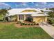 Single Gathering home with landscaped yard at 2868 Coral Way, Punta Gorda, FL 33950