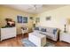 Cozy living room featuring a comfortable sofa and hardwood floors at 2868 Coral Way, Punta Gorda, FL 33950