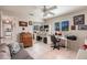 Spacious home office with a built-in desk and seating area at 2868 Coral Way, Punta Gorda, FL 33950