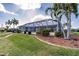 Landscaped backyard with lush greenery at 2868 Coral Way, Punta Gorda, FL 33950