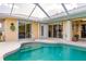Relaxing pool area with easy access to the house at 2868 Coral Way, Punta Gorda, FL 33950