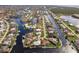 Wide aerial view showcasing the property's location within a waterfront community at 2868 Coral Way, Punta Gorda, FL 33950
