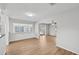Open dining area with wood-look floors and access to the back patio at 8109 San Jacinto Ave, North Port, FL 34287