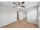 Spacious bedroom with mirrored closet and wood-look floors at 8109 San Jacinto Ave, North Port, FL 34287