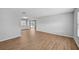 Light and airy living room with wood-look floors at 8109 San Jacinto Ave, North Port, FL 34287