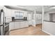 Well-equipped kitchen featuring stainless steel appliances and white cabinetry at 8109 San Jacinto Ave, North Port, FL 34287