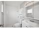 Updated bathroom with white subway tile and a shower at 8109 San Jacinto Ave, North Port, FL 34287