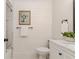 Bathroom featuring shiplap walls, marble countertop, and a combined shower and tub, offering comfort and style at 956 Harbor Town Dr, Venice, FL 34292
