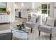 Open layout with a kitchen and dining area adjacent to a cozy living space at 956 Harbor Town Dr, Venice, FL 34292