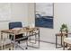 Office with modern decor, a stylish desk, a comfortable chair, and tasteful artwork for a productive workspace at 956 Harbor Town Dr, Venice, FL 34292