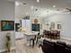 Open concept kitchen with island and dining area at 20246 Hamilton Ave, Port Charlotte, FL 33952