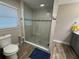 Updated bathroom with a large walk-in shower and modern fixtures at 20246 Hamilton Ave, Port Charlotte, FL 33952