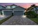 Two-car garage and paver driveway at 14624 Sycamore Ct # 2512, Punta Gorda, FL 33955