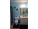 Bathroom with light blue walls and updated vanity at 3300 3300 # 3401, Punta Gorda, FL 33980