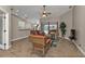 Open living area with a view into the kitchen and dining area at 2105 Holland St, North Port, FL 34288