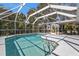 Enjoy this large screened pool with plenty of space for entertaining at 2105 Holland St, North Port, FL 34288