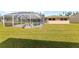 Screened-in pool with spacious backyard at 543 Lincoln Nw Ave, Port Charlotte, FL 33952