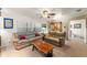 Relaxing living room featuring leather couches and wood coffee table at 543 Lincoln Nw Ave, Port Charlotte, FL 33952