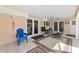 Spacious patio with seating and access to pool area at 543 Lincoln Nw Ave, Port Charlotte, FL 33952