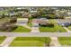Aerial view of a single-Gathering home with a pool at 543 Lincoln Nw Ave, Port Charlotte, FL 33952